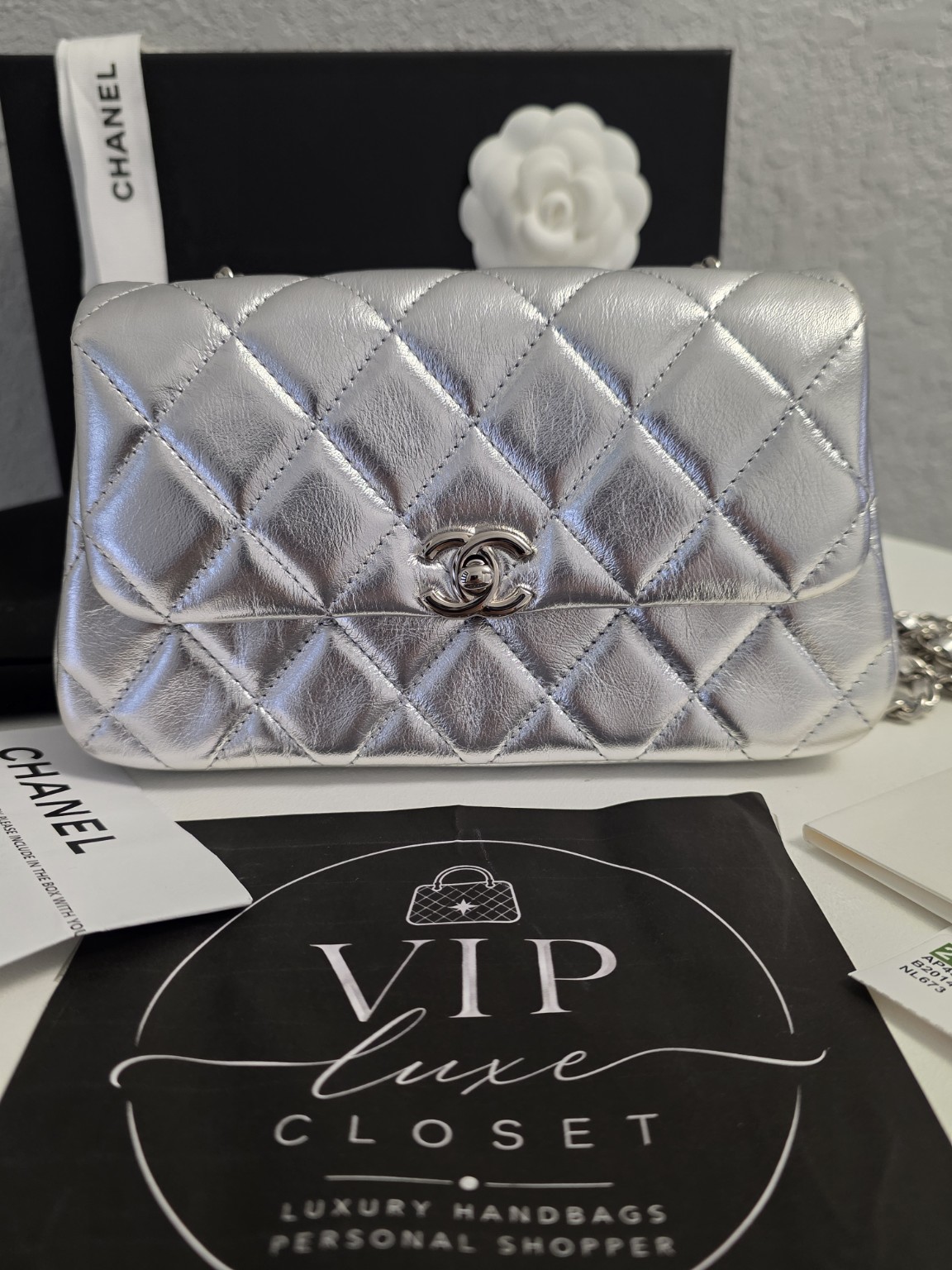 Silver Chanel quilted flap handbag
